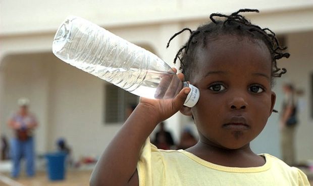 child with water bottle