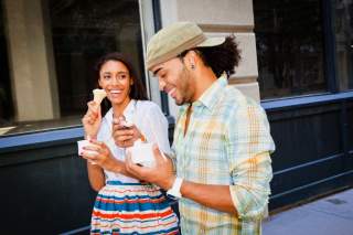 Eating while on the go. Image by © Sara Wight/Corbis