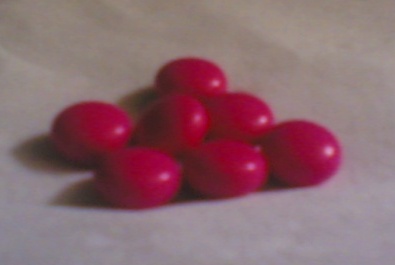 Red vitamin E pills