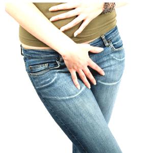 woman clasping bladder area indicating distress from urinary tract infection