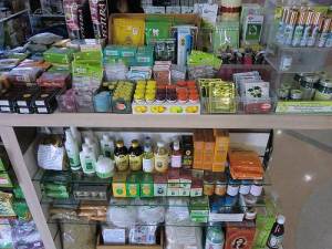 home-remedies-on-shelf natural herbal and home remedies on shelf at herb shop